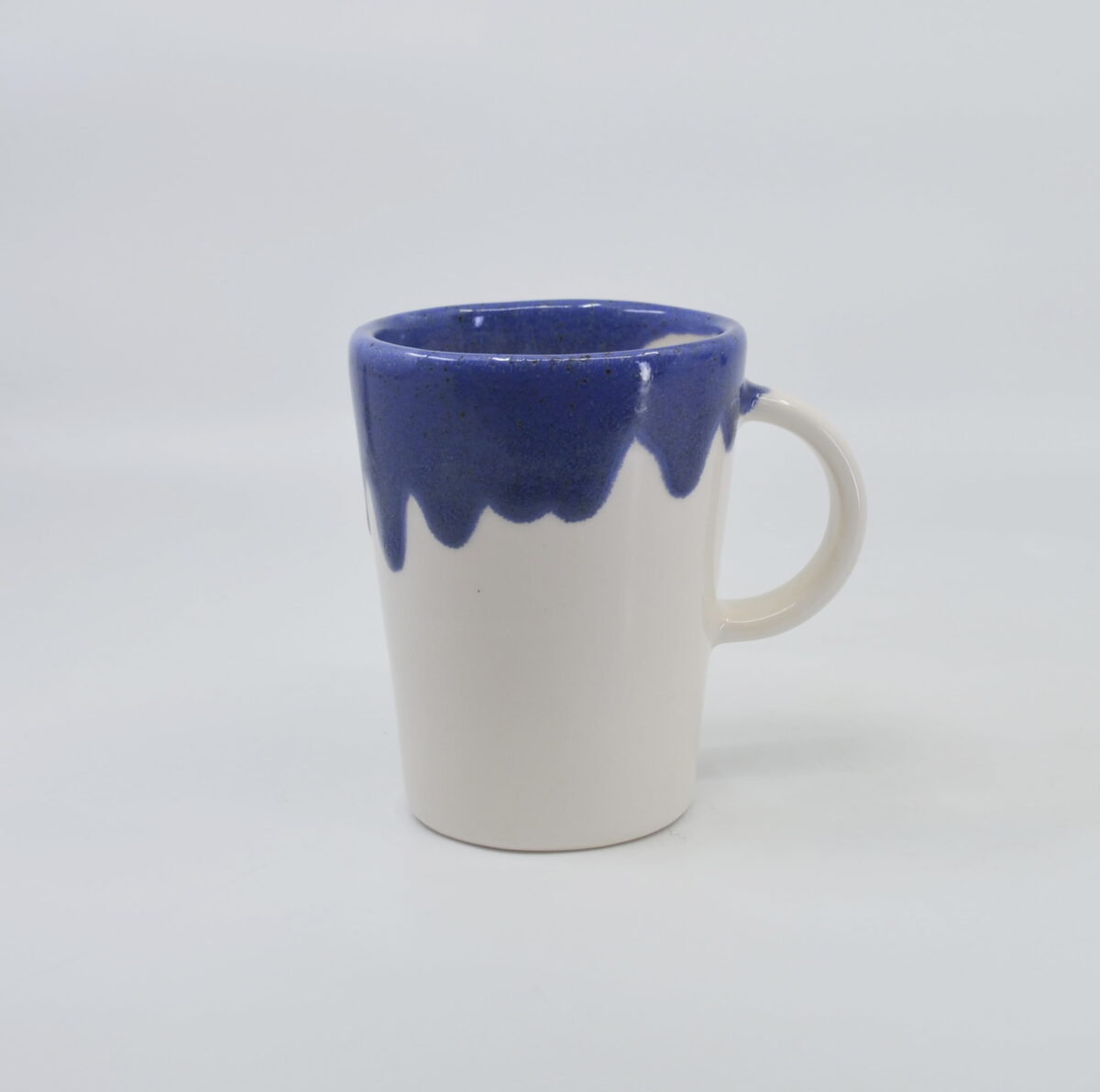 Drippy blue glaze cup